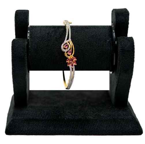 Gold Bracelet with Pink Stone Detailing